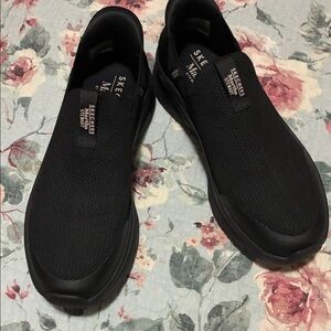 Skechers Women’s  Black Slip-On Sneakers